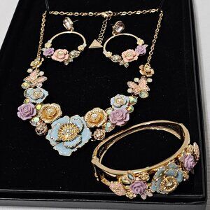 GUESS GOLD TONE MIXED COLOR STONE FLOWER STATEMENT SET !!!! PRE-OWNED!!!